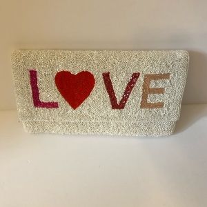 Beaded love clutch with strap